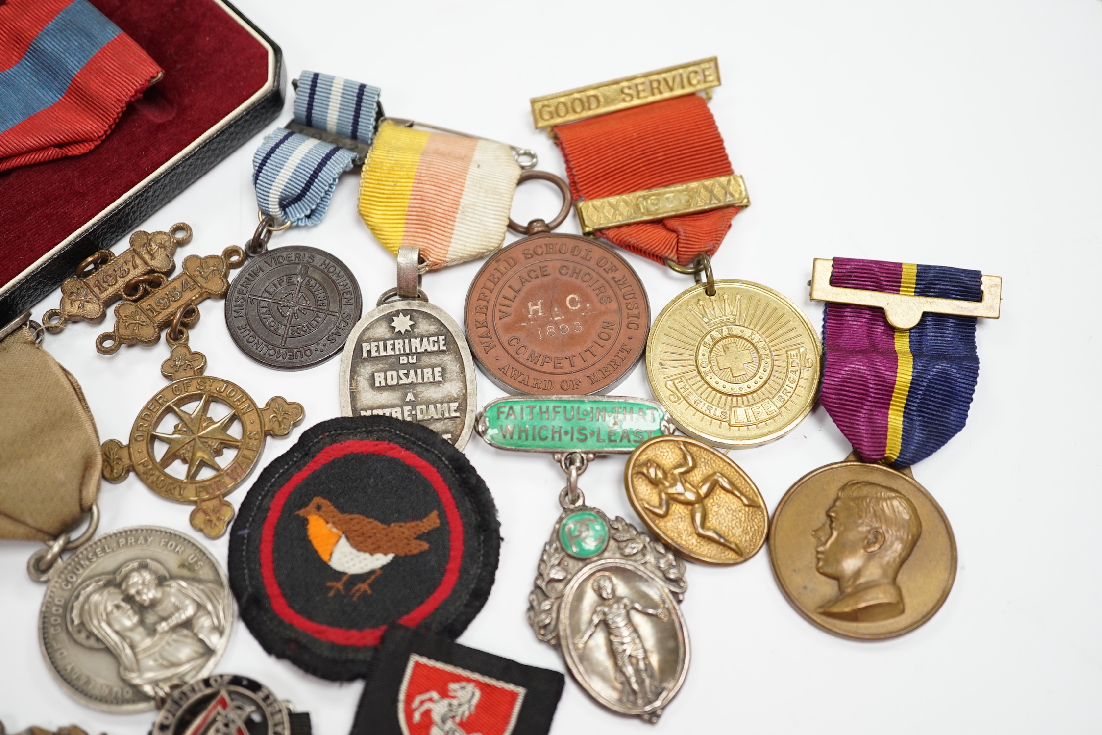 A collection of medals and badges, including eight Special Constabulary Service Medals, Fire Service Medal, a cased Police Long Service and Good Conduct Medal, masonic awards, including hallmarked silver gilt 1897 Diamon